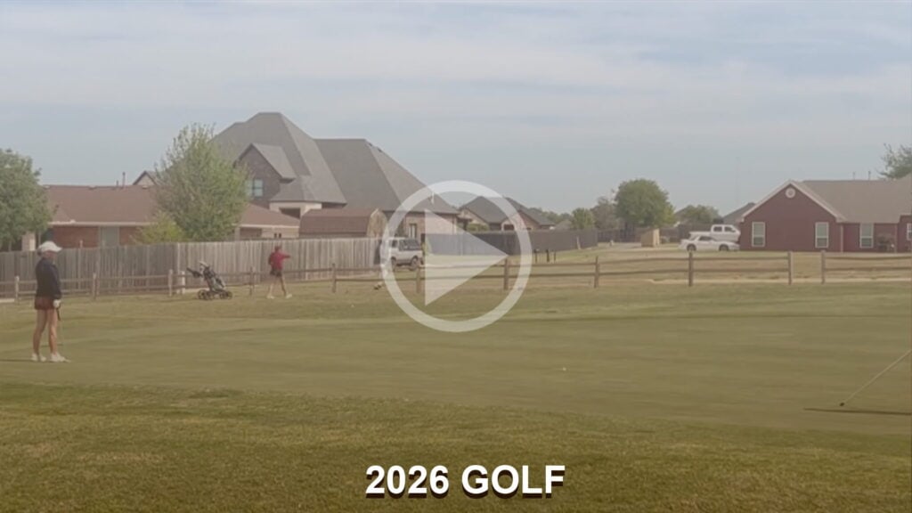 2026 Elk City golf placard on course with players and homes in background BigElkTV